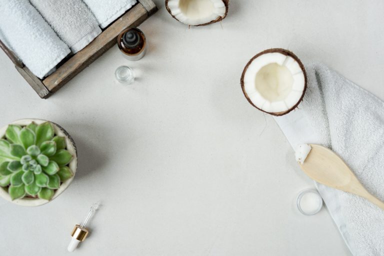 Flat lay of beauty products with coconut oil